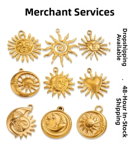 Macro view of nine gold vintage celestial pendants with sun and moon designs