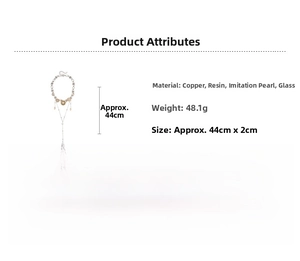 Detail showing baroque drop necklace dimensions 44cm by 2cm with copper and resin materials