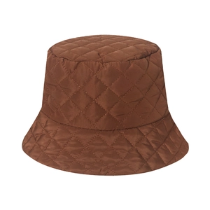 Detail of deep brown quilted bucket hat with diamond stitching and silky sheen finish