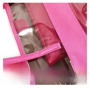 Macro detail of high-quality stitching on pink leather and transparent PVC beach bag