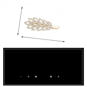 Detail showing leaf-shaped rhinestone hair clip dimensions: 6.9cm long and 2.5cm wide