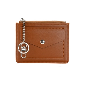Brown faux leather coin purse with front snap pocket, top zipper and metal keychain