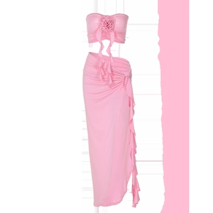 Detail of pink two-piece set featuring a 3D rose tube top and high waist slit skirt