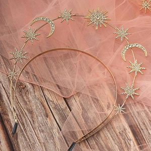 Detail of golden sun goddess headband with crystal stars, crescent moons and anti-slip tips