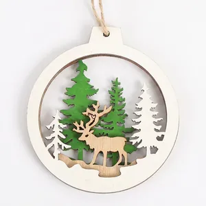 Round hollowed wooden Christmas ornament with reindeer and forest laser cut design