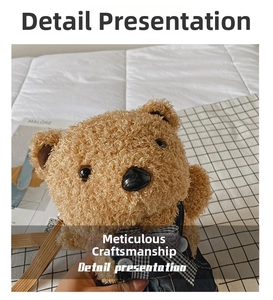 Close-up of cute brown plush bear crossbody bag with denim overalls and bow tie detail