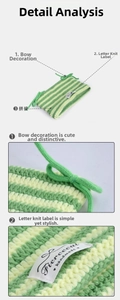 Detail view of the handmade crochet stripes and the decorative green bow on the beanie