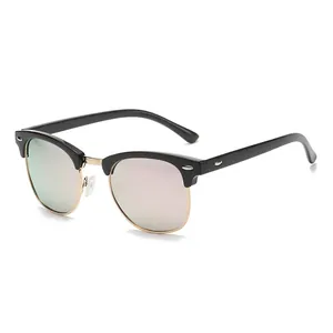 Classic half-frame polarized sunglasses with black browline and gold metal rim accents