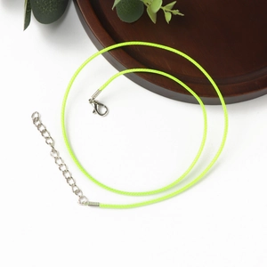 Adjustable neon green braided necklace cord with silver lobster clasp and extension chain