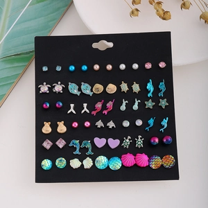 Set of 30 pairs of ocean-themed earrings featuring dolphins, turtles, and colorful shells