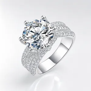Macro detail of a 925 silver moissanite ring with six-prong setting and pavé band