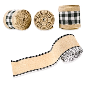 Macro detail of buffalo check burlap ribbons showing natural jute texture and rustic edges