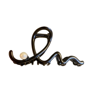 Elegant wavy black metallic hair claw clip with a single white pearl accent for women