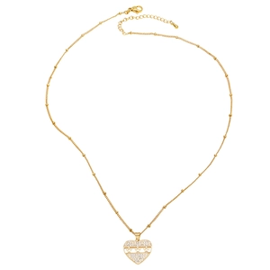 Gold heart pendant necklace with micro-pave zircons and star patterns on white background