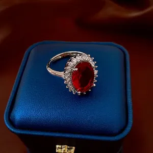 Retro European oval red zircon ring with halo crystals and adjustable silver band