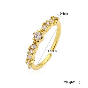 Detail view of gold geometric ring with zircon stones showing 0.4cm width and 3g weight