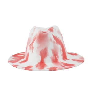 Close-up of a stylish red and white tie-dye wool fedora hat with wide brim design