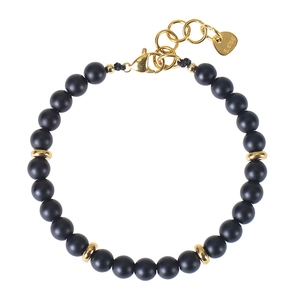 Detail of 6mm black matte beads and gold stainless steel lobster clasp on a beaded bracelet