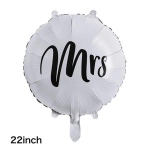 Detail view of a 22-inch white round Mrs balloon with matte finish and black lettering