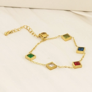 Detail of 18K gold-plated titanium bracelet featuring multi-colored square zircon stones