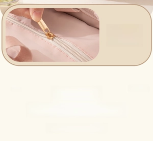 Detail of pink thermal bag showing smooth metal zipper and durable nylon handle strap