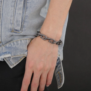 Vintage dark grey titanium steel nail hook chain bracelet worn on male wrist
