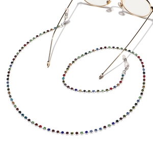 Detail of colorful rhinestone anti-slip eyewear chain with golden metal links