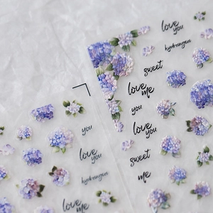 Watercolour hydrangea nail art stickers with delicate blue flowers and artistic script