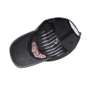 Detail view of washed cotton baseball cap interior with 100% cotton label and support