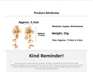 Detailed view of large gold flower tassel earrings with crystals and precise dimensions