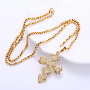 Gold plated stainless steel cross necklace with textured heart petals on box chain