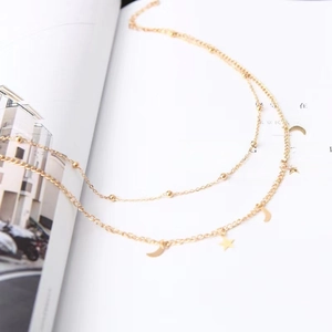 Double-layered gold stainless steel anklet with moon star charms and beaded chain links