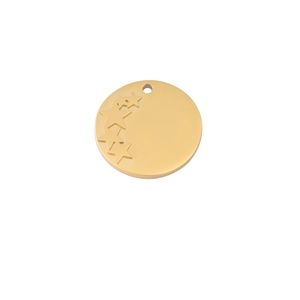 Detail showing gold round pendant with embossed star motif and polished metal surface