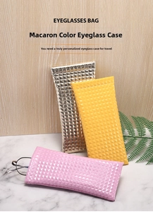 Detail showing 3D pyramid texture and metallic finish on colorful PU leather eyewear bags