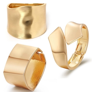 Fashionable gold layered cuff bracelet set with matte and polished metallic finish
