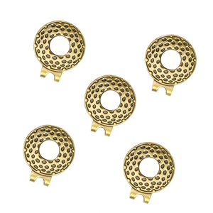 Detail view of five vintage bronze golf ball markers with hammered texture and cap clips