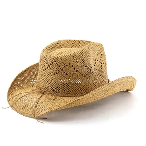 Detailed close-up of straw cowboy hat with hand-woven texture and rope bow detail