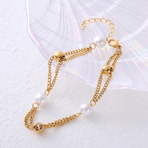 Elegant 18k gold double-layer chain bracelet with freshwater pearls and beads