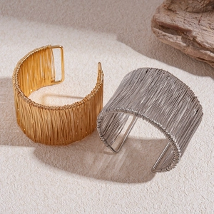 Minimalist twisted geometric open bangle bracelets in gold and silver finish for women