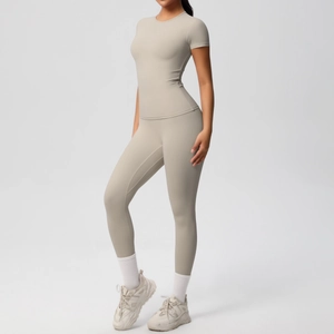 Full view of high-waist yoga set with short sleeve t-shirt in beige grey sports fabric