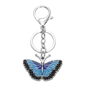 Creative metal blue butterfly keychain with enamel finish and lobster clasp on white background
