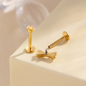 Golden titanium heart and butterfly flat back lip stud with internal threading
