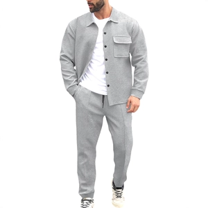 Men's grey casual suit with waffle textured jacket and trousers in a stylish fit