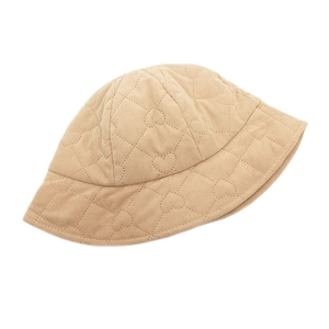 Detailed view of the heart-quilted texture on the light khaki corduroy bucket hat