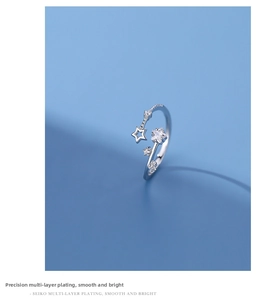Detail of s925 sterling silver star ring with zircon inlay and electroplated finish