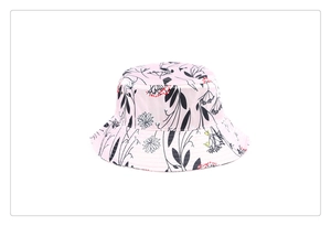Detail of floral bucket hat featuring vintage ethnic patterns and pink silk-like fabric
