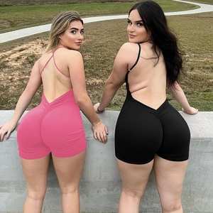 Detail showing backless design and scrunch butt feature on pink and black jumpsuits