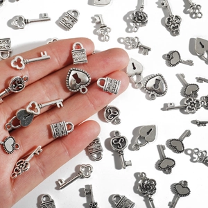 Assorted silver alloy key and lock charms for DIY jewelry making and handmade necklaces