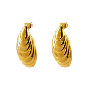 Polished golden shell design stainless steel hoop earrings on a clean white background
