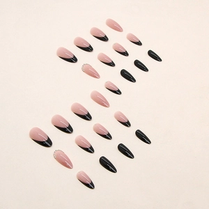 French black tip almond press-on nails with rhinestones on a 24-piece elegant set
